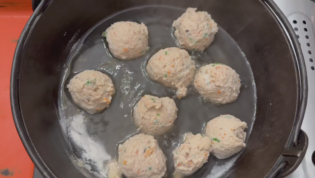 Load video: Shiitake and Carrot Studded Chicken Meatball Hot Pot