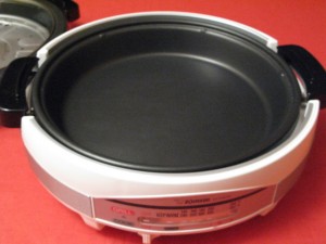 Shallow skillet; the photo with a glass lid is a deeper skillet