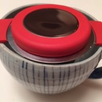 tea cup and tea strainer